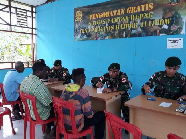 Lagi, TNI Gelar Pengobatan Gratis untuk Warga di Perbatasan Papua - PNG