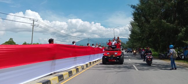 MURI : Pembentangan Bendera Merah Putih Sepanjang 10 Km di Kota Jayapura Raih Rekor Dunia