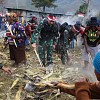 Acara  Bakar Batu Sambut Hut Kemerdekaan, Satgas Yon 203/AK Sumbang Seekor Babi