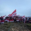 TNI Bersama Masyarakat Gelar Upacara dan Bentangkan Bendera Raksasa Diatas Puncak Gunung Enarotali