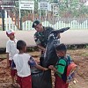 TNI Ajarkan Anak anak di Perbatasan Merauke Cinta Kebersihan Sejak Dini